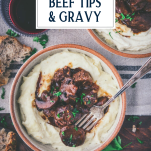 Overhead shot of a fork in a bowl of beef tips and gravy with text title overlay.