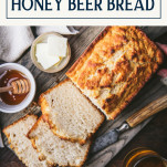 The best beer bread recipe on a wooden tray with text title box at top