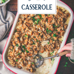 Pan of chicken broccoli stuffing casserole with text title overlay