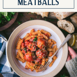 Overhead shot of hands holding a bowl of pasta and chicken meatballs with text title box at top