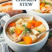 Crock Pot chicken stew with text title overlay.