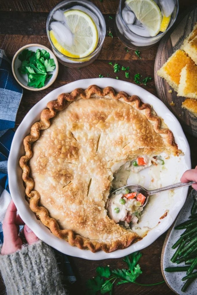 Overhead image of an easy chicken pot pie on a wooden table