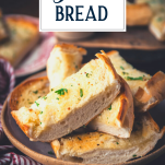 Basket of the best garlic bread recipe with text title overlay