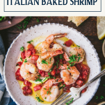 Overhead shot of a bowl of sheet pan shrimp with text title box at top