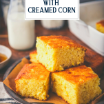 Plate of slices of cornbread with creamed corn and text title overlay.