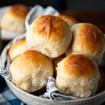Close up side shot of easy dinner rolls in a bowl