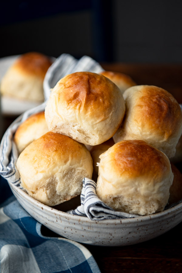 Close up side shot of easy dinner rolls in a bowl