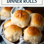 Close up shot of a basket of easy dinner rolls with text title box at top