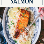 Fork eating a plate of orange glazed salmon with text title box at top.