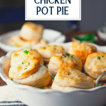 Close up side shot of easy chicken pot pie recipe with biscuits and text title overlay