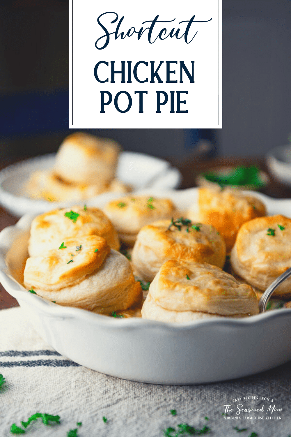 Close up side shot of easy chicken pot pie recipe with biscuits and text title overlay