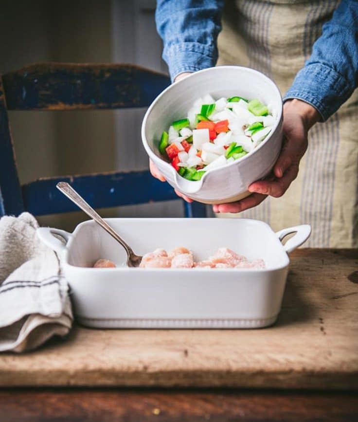 Process shot showing how to bake sweet and sour chicken.