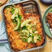 Horizontal overhead shot of a pan of easy beef enchilada casserole.