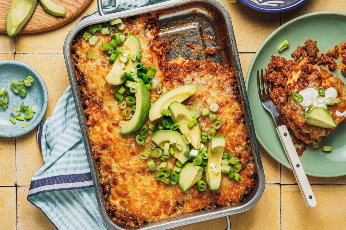 Horizontal overhead shot of a pan of easy beef enchilada casserole.