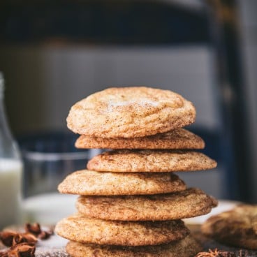 Stack of the best snickerdoodle recipe on a wooden board