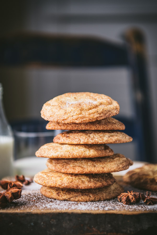 Stack of the best snickerdoodle recipe on a wooden board