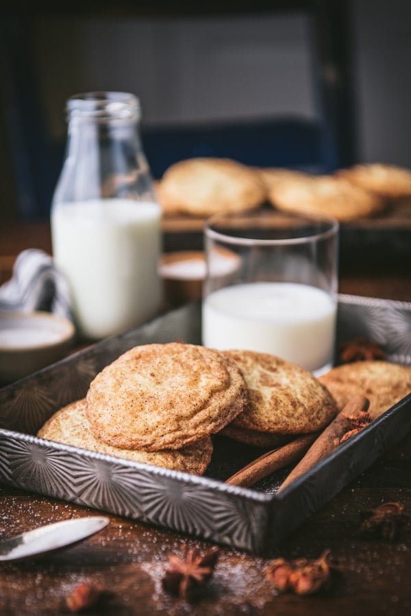 Side shot of a tray of milk and the best snickerdoodle recipe