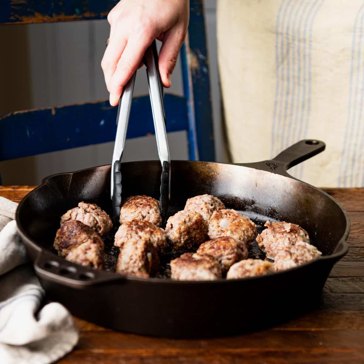 Process shot showing how to make an authentic Swedish meatballs recipe.