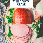 Overhead shot of hands slicing a baked ham with text title overlay