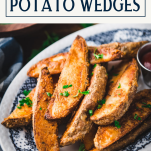 Close up shot of potato wedges on a plate with text title box at top