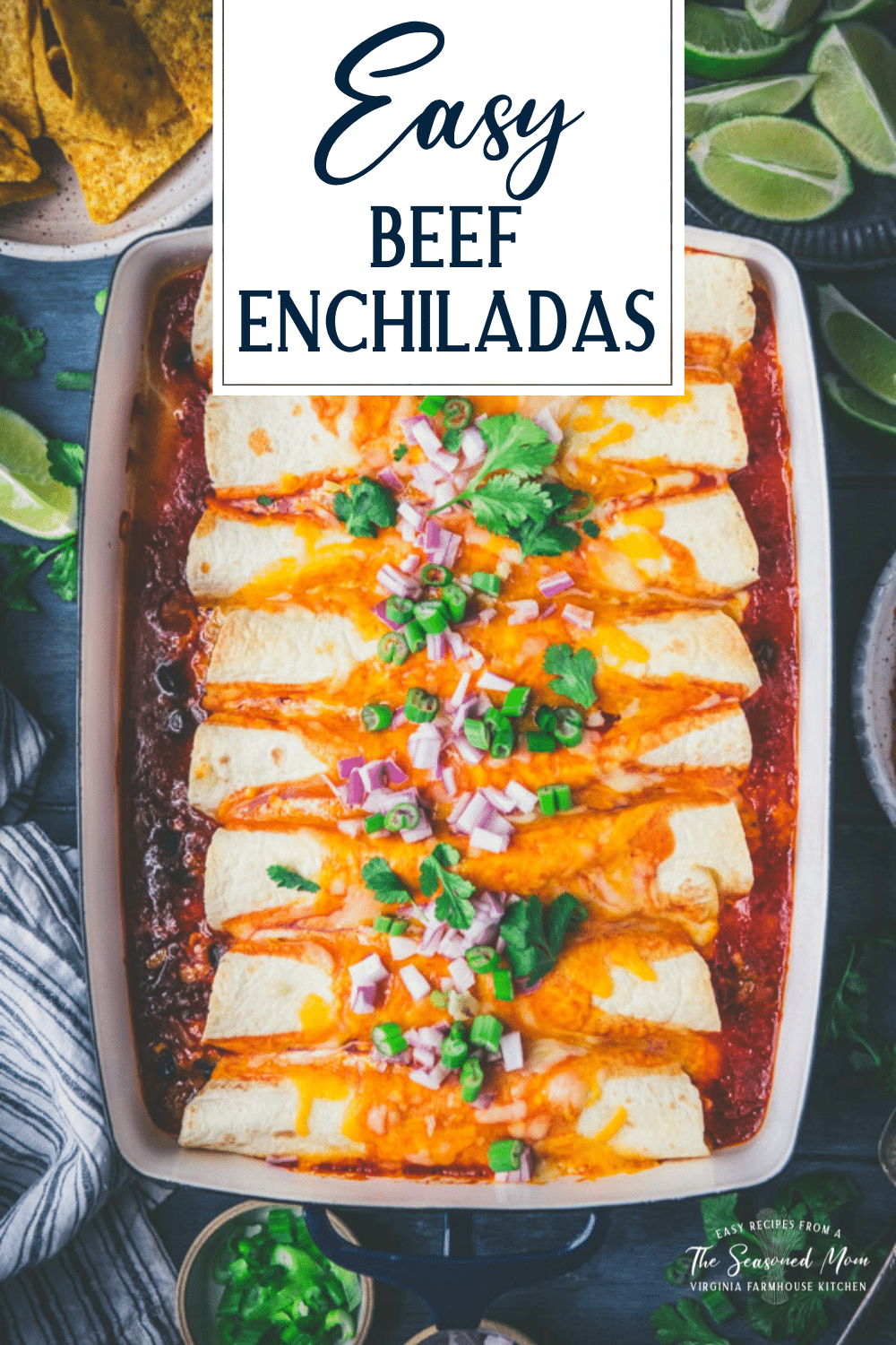 Overhead image of a tray of the best beef enchilada recipe with text title overlay