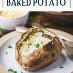 Close up side shot of baked potato in oven with text title box at top