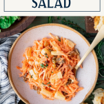 Overhead shot of a bowl of carrot salad with text title overlay