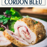 Close up side shot of baked chicken cordon bleu with text title box at top