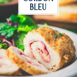 Close up side shot of a sliced chicken cordon bleu recipe with text title overlay