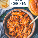 Overhead shot of the best pulled bbq chicken in crock pot with text title overlay