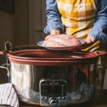 Adding boneless skinless chicken breast to a slow cooker