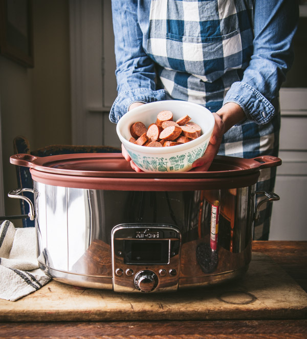 Adding andouille sausage to a slow cooker