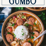 Overhead shot of a spoon in a bowl of crockpot gumbo with text title box at top