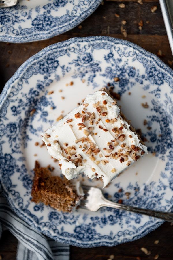 Close overhead shot of a slice of carrot cake on a plate