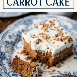 Close up shot of easy carrot cake recipe on a plate with a fork with text title box at top