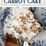 Close overhead image of a slice of the best carrot cake recipe with text title box at top