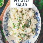 Overhead shot of an easy potato salad recipe in a bowl with text title overlay