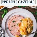 Plate of the best pineapple casserole recipe with text title box at top