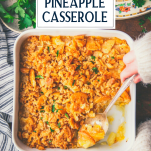 Overhead image of a southern pineapple casserole in a white baking dish with text title overlay