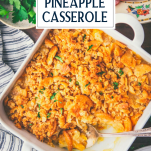 Overhead image of a pan of pineapple casserole with text title overlay