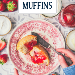 Strawberry muffin on a plate with text title overlay