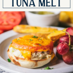 Tuna melt recipe served on a white plate with text title box at top
