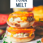 Stacked tuna melt sandwich with text title overlay