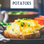 Tray of twice baked potatoes with ham and salad and text title overlay