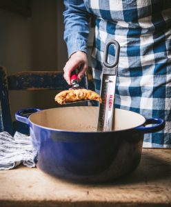 Frying chicken tenders in a cast iron skillet