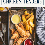 Tray of crispy fried chicken tenders with text title box at top