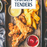 Tray of fried chicken tenders with text title overlay