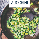 Pan of sauteed zucchini with text title overlay