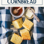 Overhead shot of a tray of the best cornbread recipe with text title box at top
