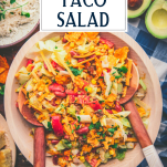 Overhead shot of doritos taco salad with text title overlay